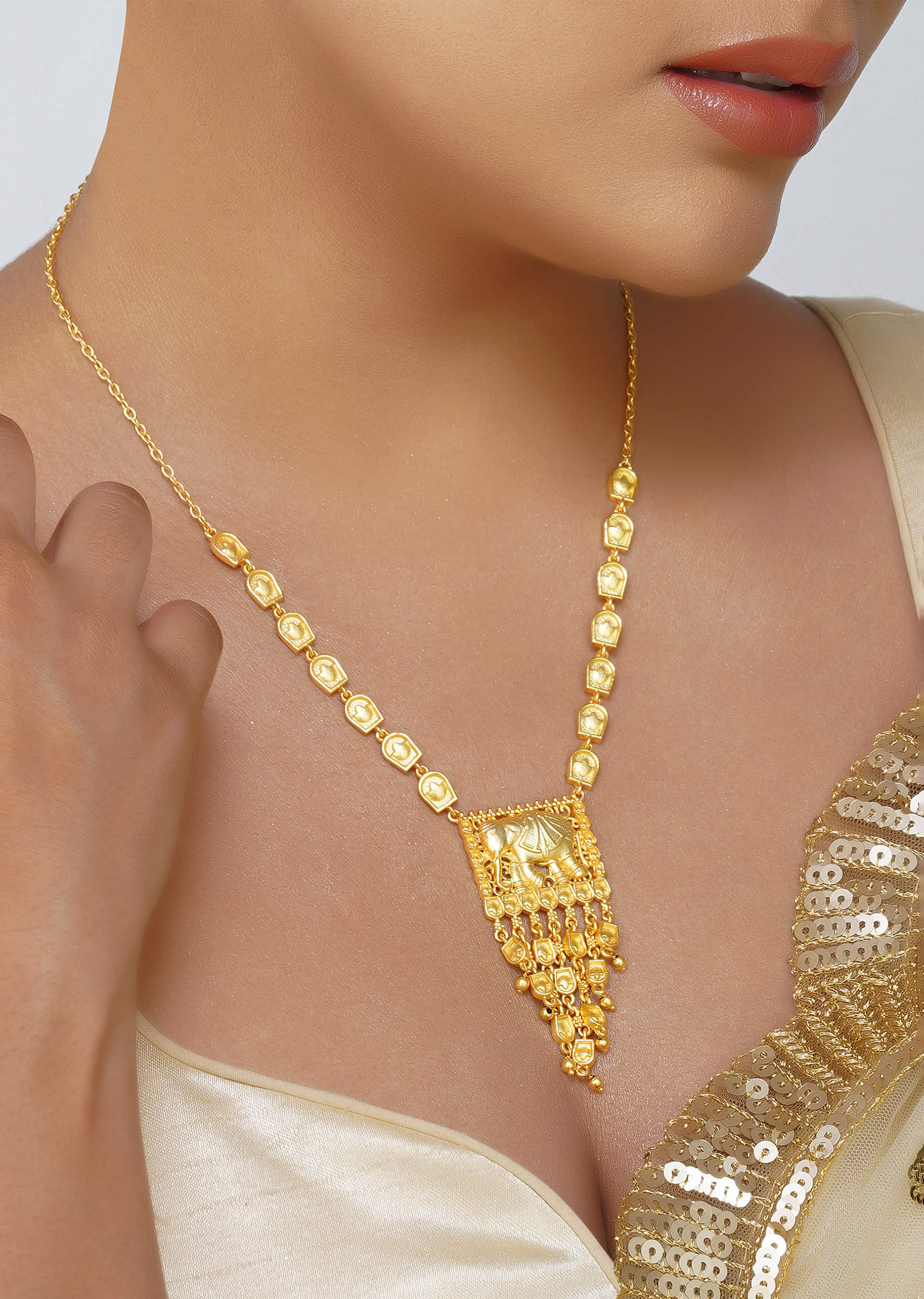 Antique Gold Pendant Necklace With Tusk Motif