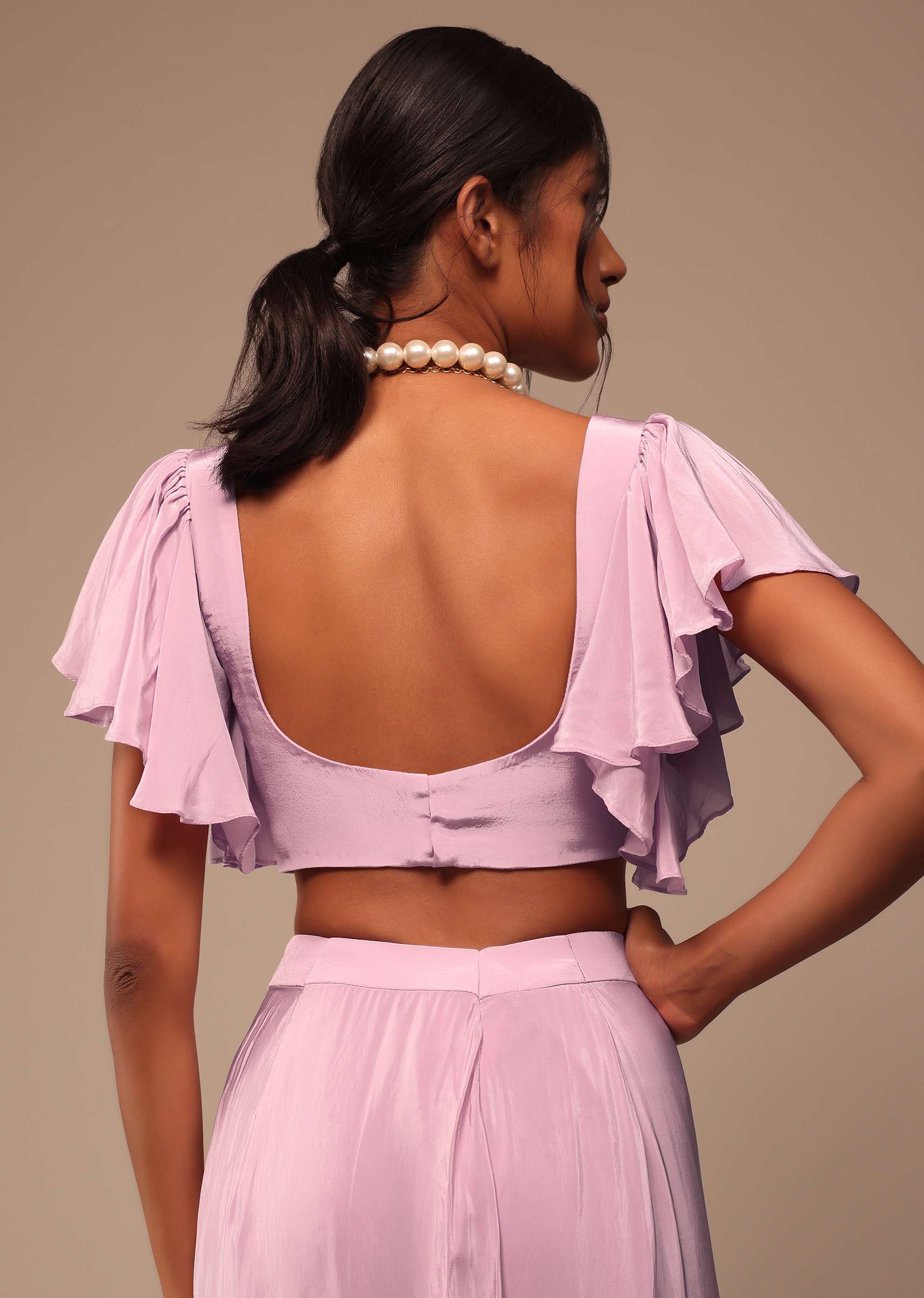Baby Pink Crepe Saree With Fancy Bow Shaped Blouse And Belt - Image 3