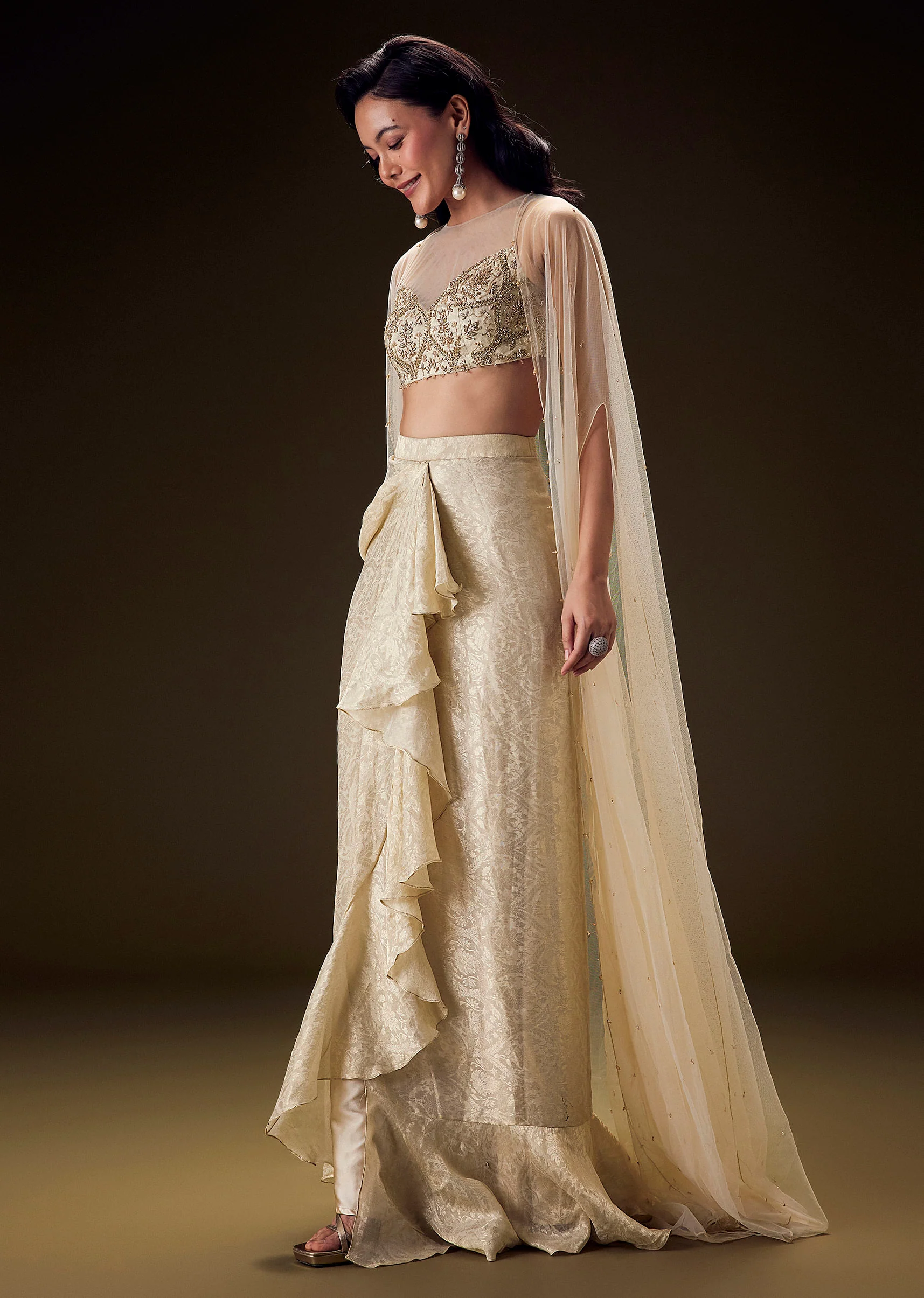 Beige Zardozi Embroidered Blouse With Brocade Drape Skirt And Net Cape - Image 4