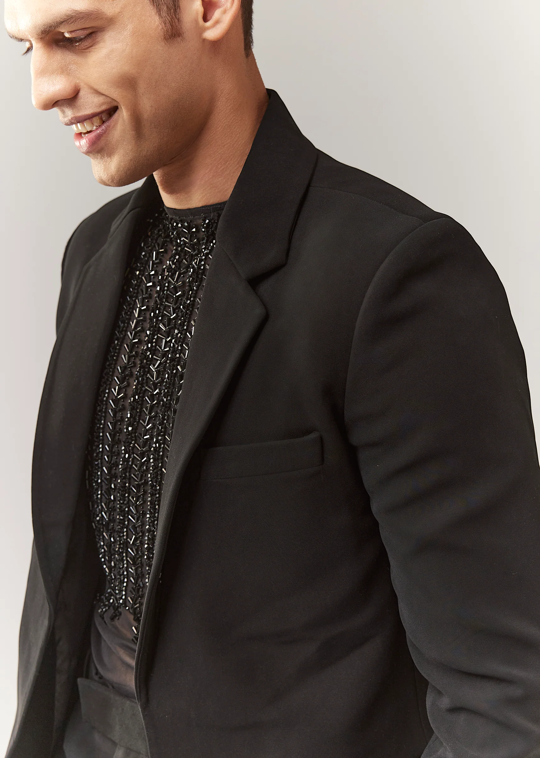 Black Evening Duo – Draped Crop Top Skirt Set For Her And Embellished Indo Western Set For Him - Image 8
