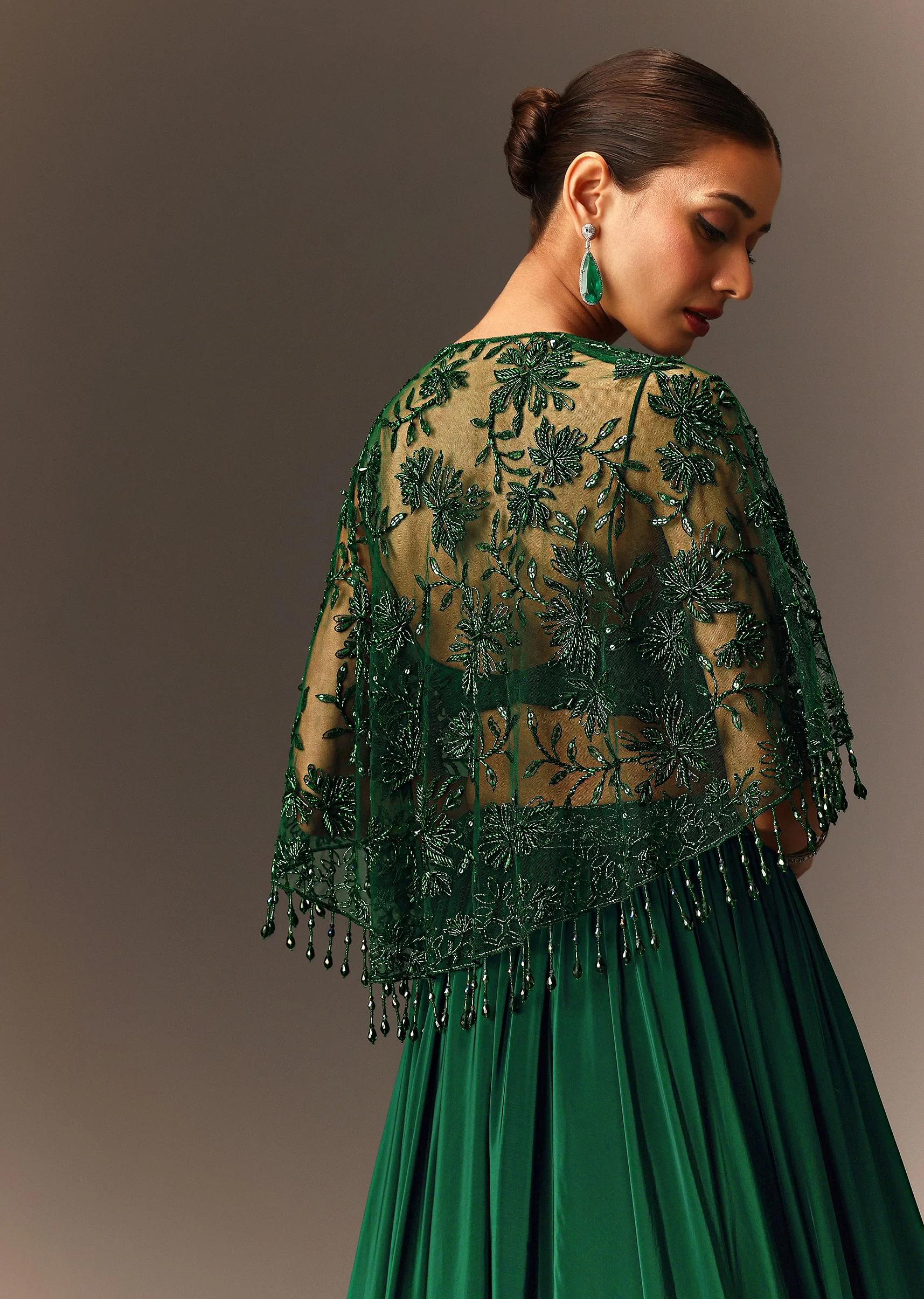 Bottle Green Tiered Lehenga With Net Cape - Image 4