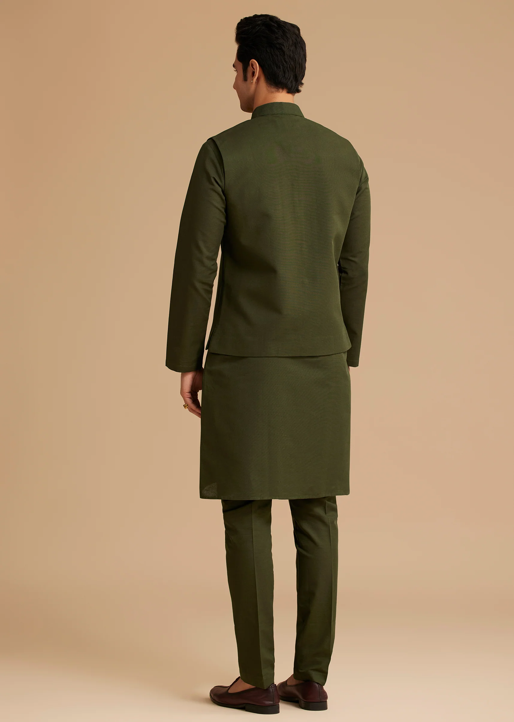 Coordinated Festive Couple Set – Seaweed Green Hand-Embroidered Draped Pallu Sharara for Her And Green Cotton Kurta Set with Embroidered Pocket & Collar for Him - Image 10