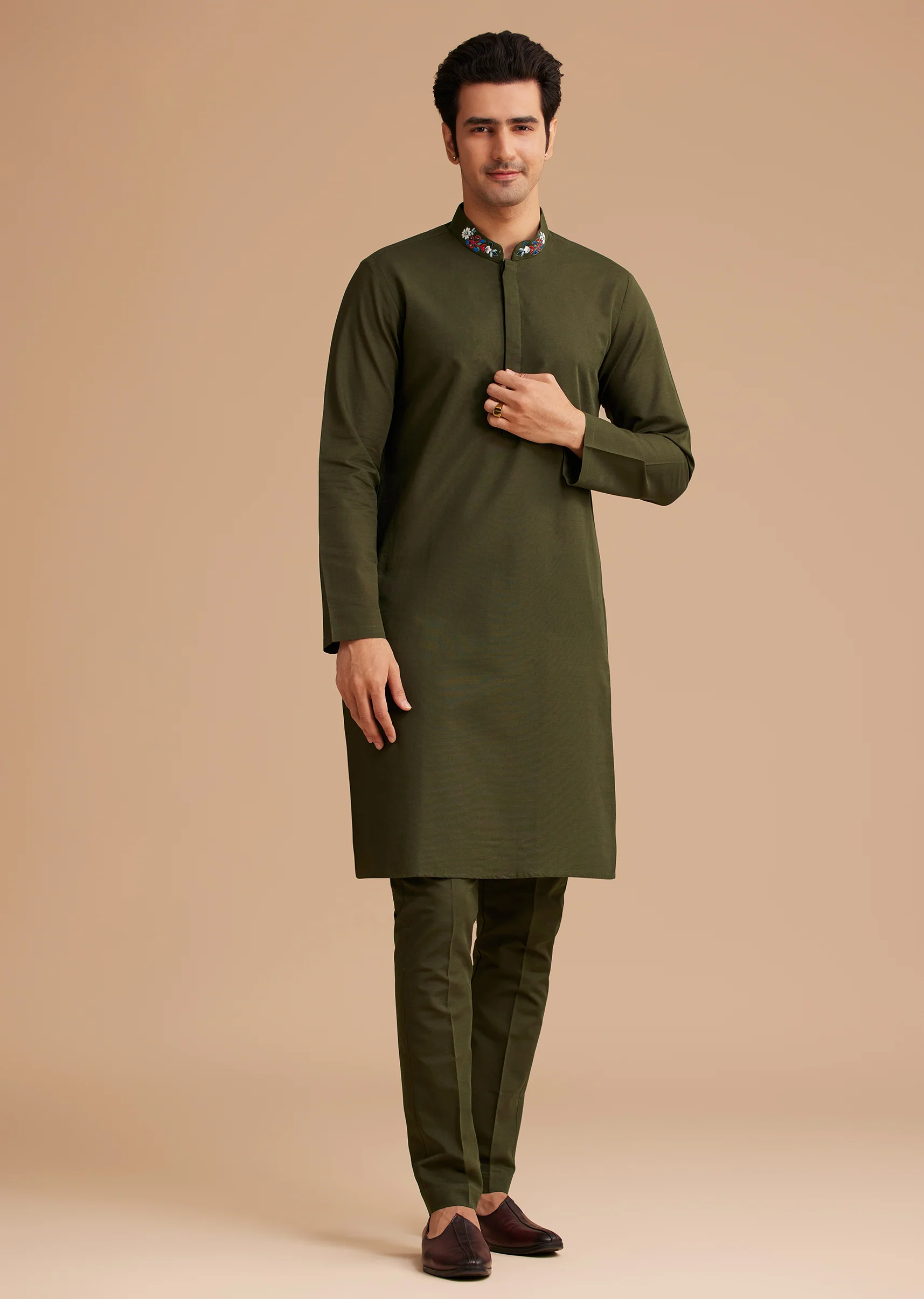 Coordinated Festive Couple Set – Seaweed Green Hand-Embroidered Draped Pallu Sharara for Her And Green Cotton Kurta Set with Embroidered Pocket & Collar for Him - Image 9