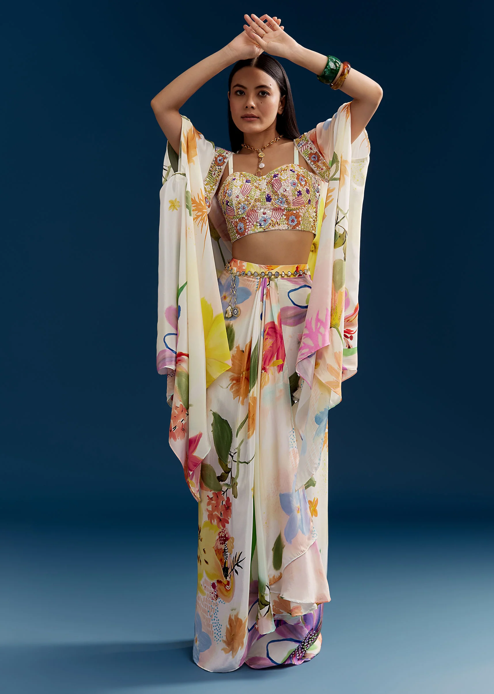 Cream Crop Top Skirt Set With Embroidered Cape And Floral Print