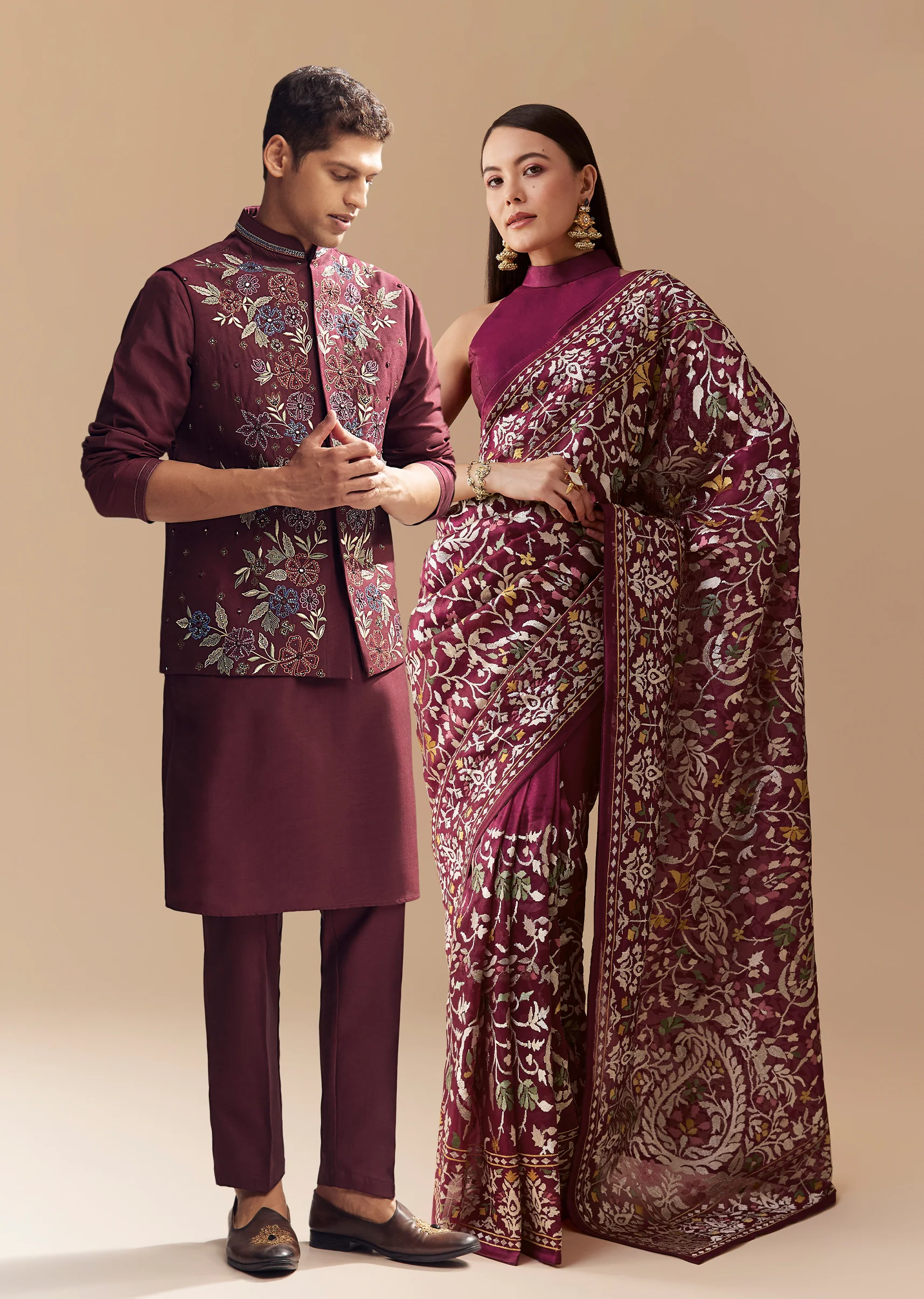Festive Couple Set – Wine Tissue Organza Embroidered Saree For Her And Red Silk Kurta Jacket Set With Resham Embroidery For Him