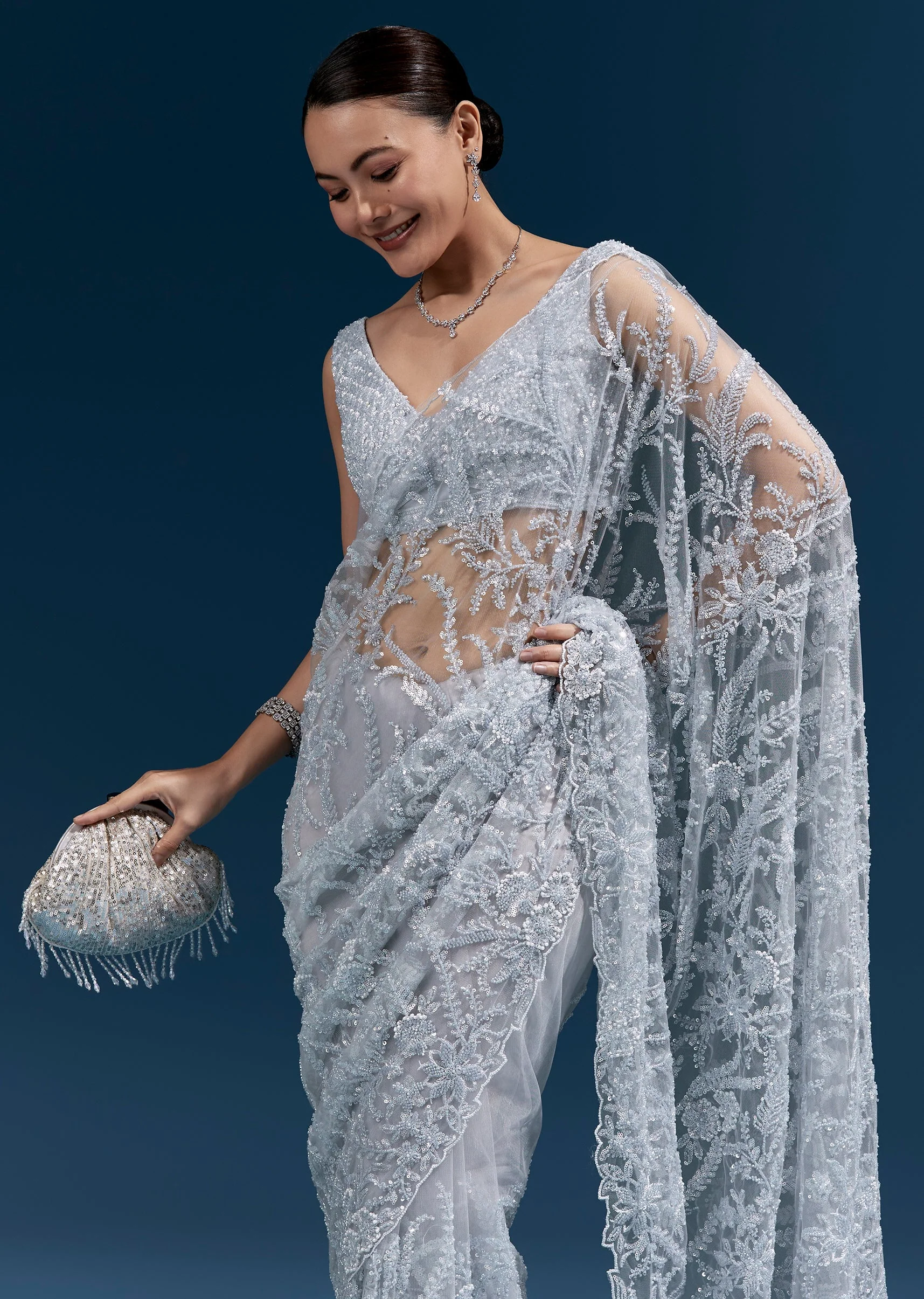 Ice Blue Heavy Embroidered Net Saree With Cutwork Border And All Over Floral Jaal - Image 5