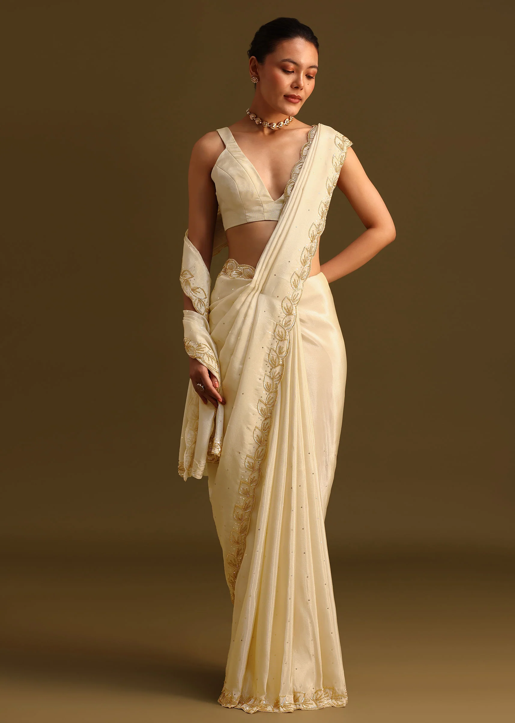 Ivory Tissue Saree With Cutdana Embroidered Border and Unstitched Blouse - Image 3