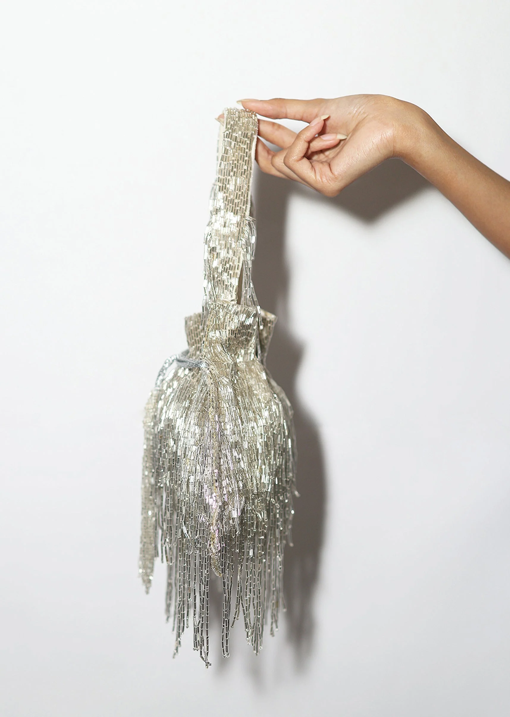 Luminous Silver Cut Dana Potli - Image 3