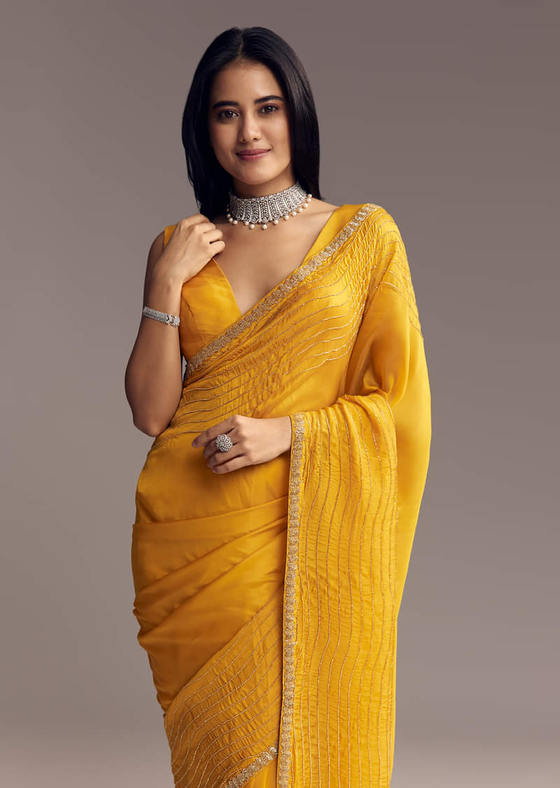 Mustard Yellow Organza Saree With Scallop Border And Stone Work