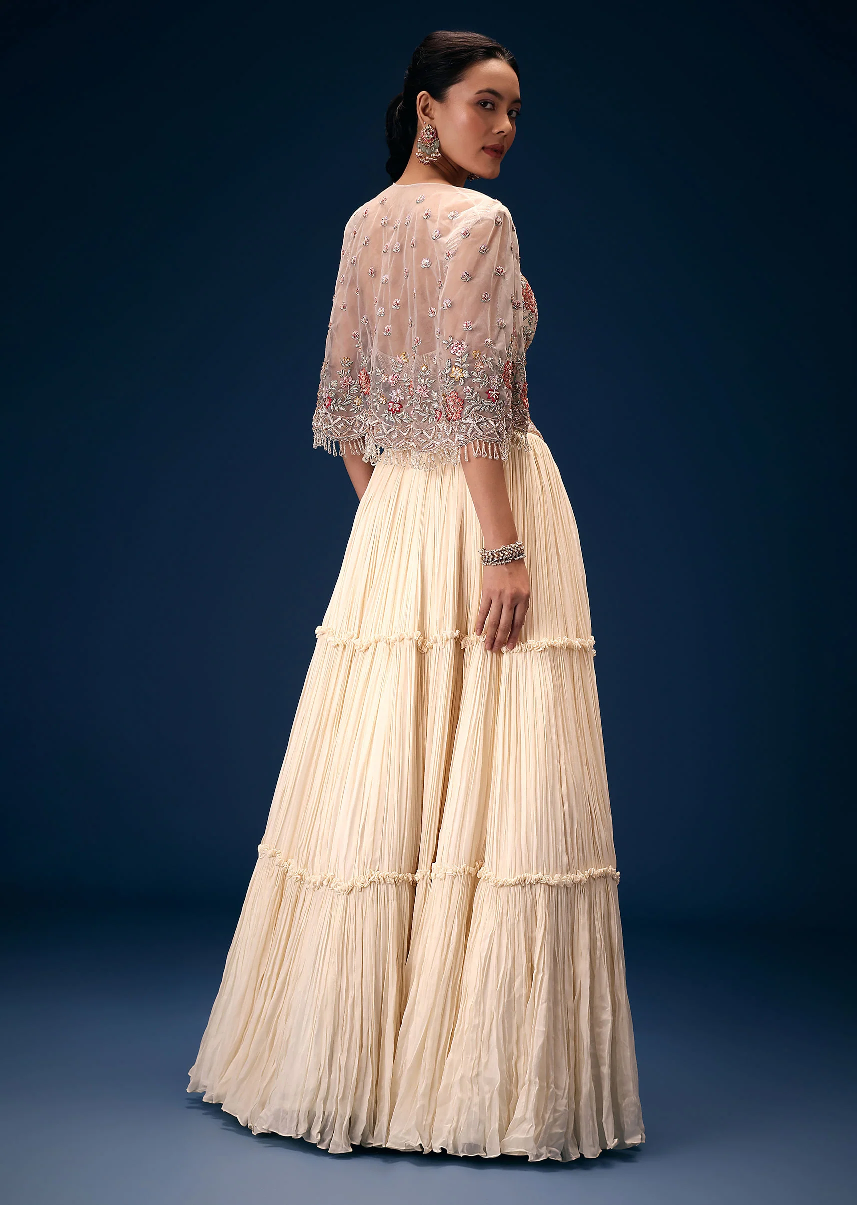 Off White Tiered Lehenga With Embroidered Corset Blouse And Embroidered Cape - Image 5
