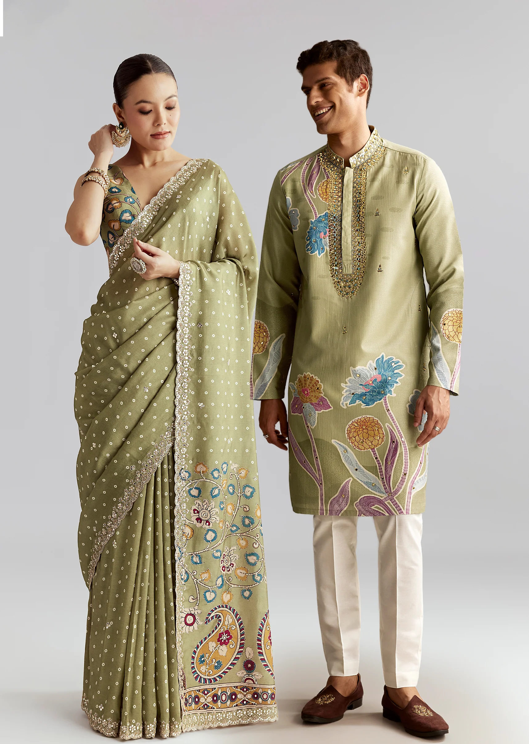 Pastel Day Couple Set – Pista Green Hand-Embroidered Muslin Saree for Her And Pastel Green Mirror Work Kurta Set for Him