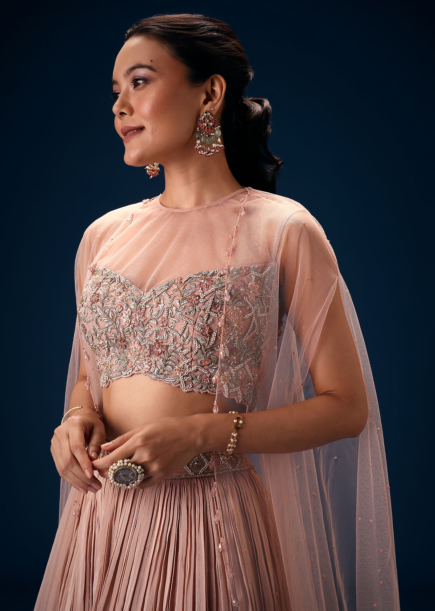 Peach Ruched Lehenga With Embroidered Blouse and Net Cape - Image 4