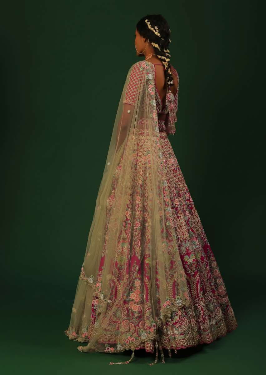 Rani Pink Lehenga Choli In Raw Silk With Heavy Embroidered Kalis Using Colorful Resham And Cut Dana In Floral Motifs Online - Kalki Fashion - Image 6