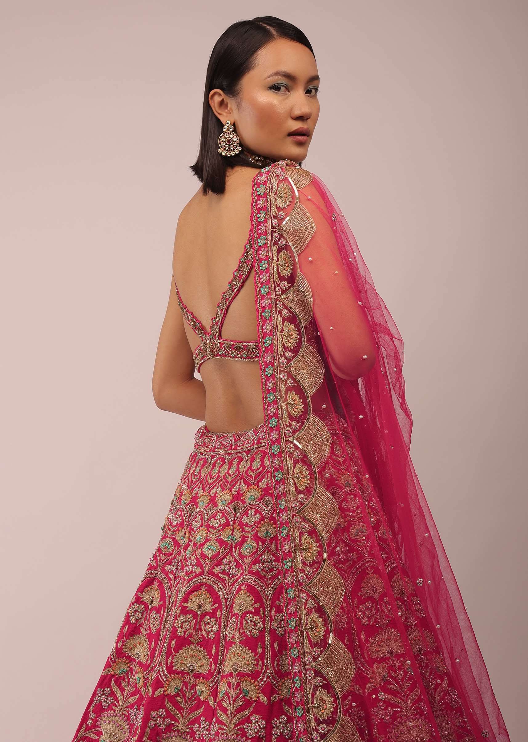 Rani Pink Lehenga In Golden Zari Work Embroidery Inspired By Mughal Architecture With Matching Net Dupatta In Embroidered Buttis - Image 5