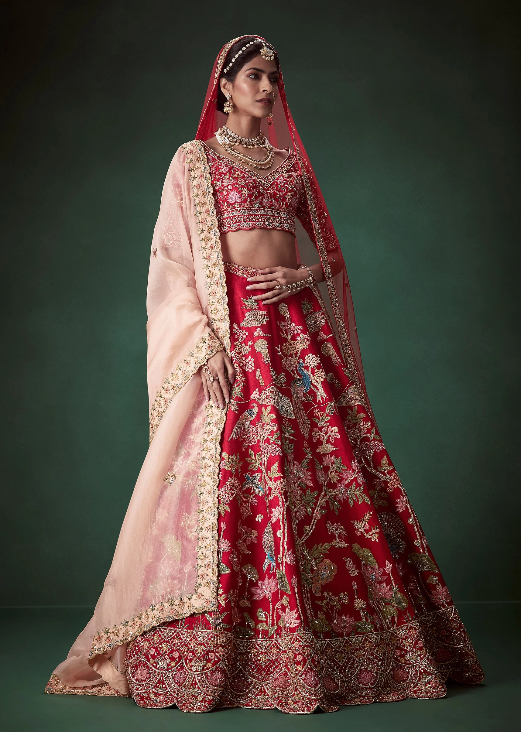 Red Heavy Butti Embellished Bridal Lehenga Set - Image 4