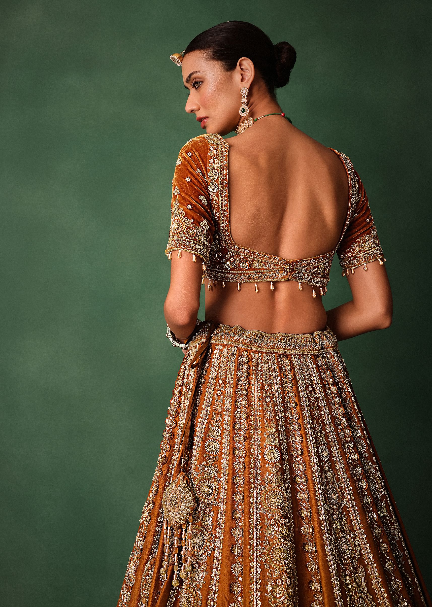 Rust Embroidered Bridal Lehenga With Deep Neckline Blouse And Dupatta - Image 4