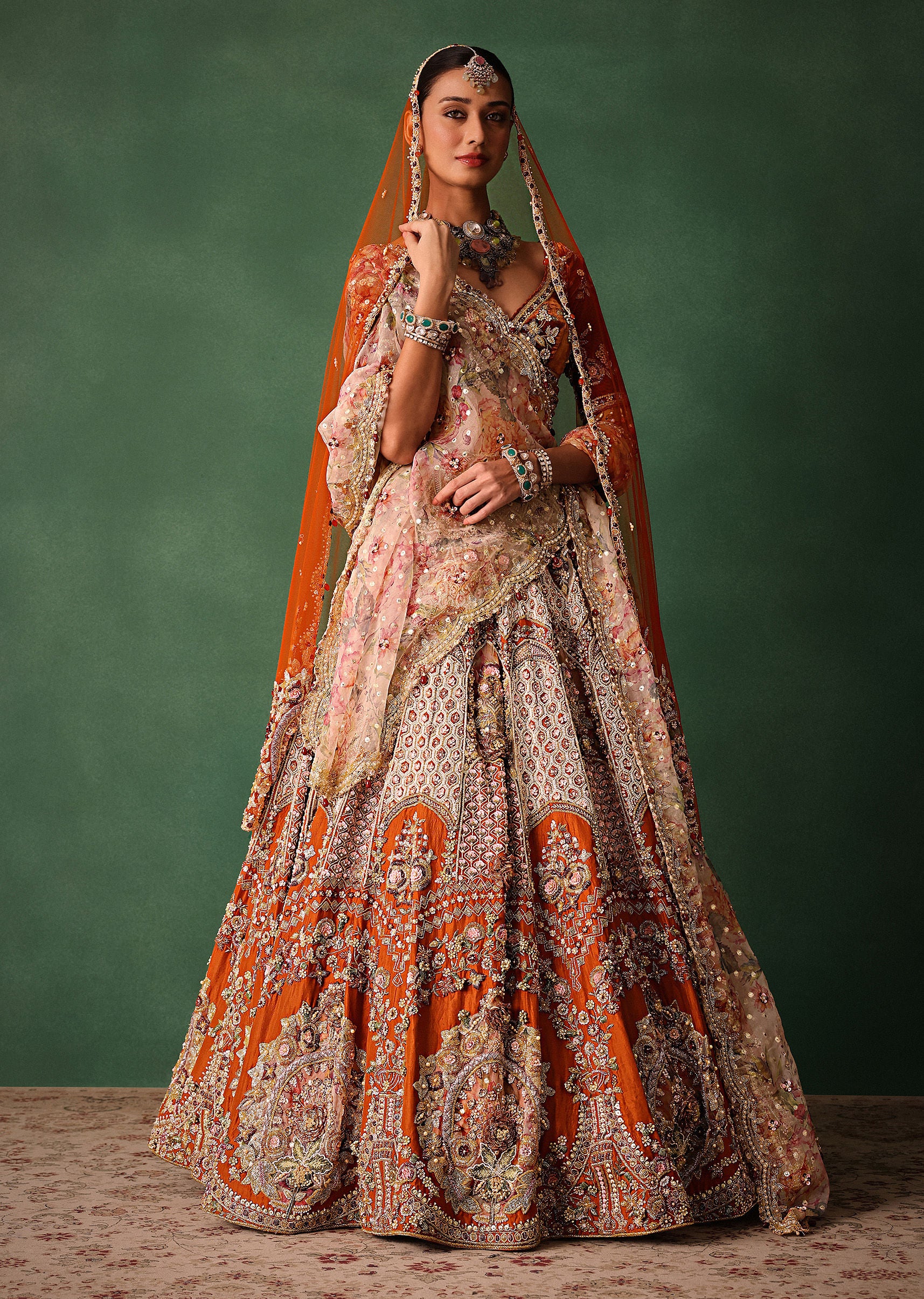 Rust V Neck Blouse With Heavy Jaal Cutdana Work Bridal Lehenga And Heavy Dupatta