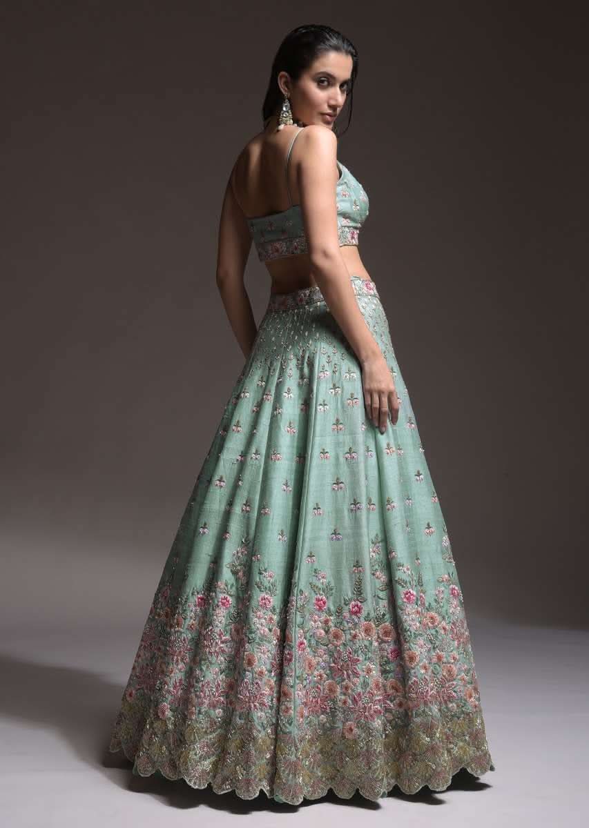Sage Green Lehenga Choli In Raw Silk With Vibrant Resham Embroidered Cluster Of Summer Blooms And Buttis - Image 11