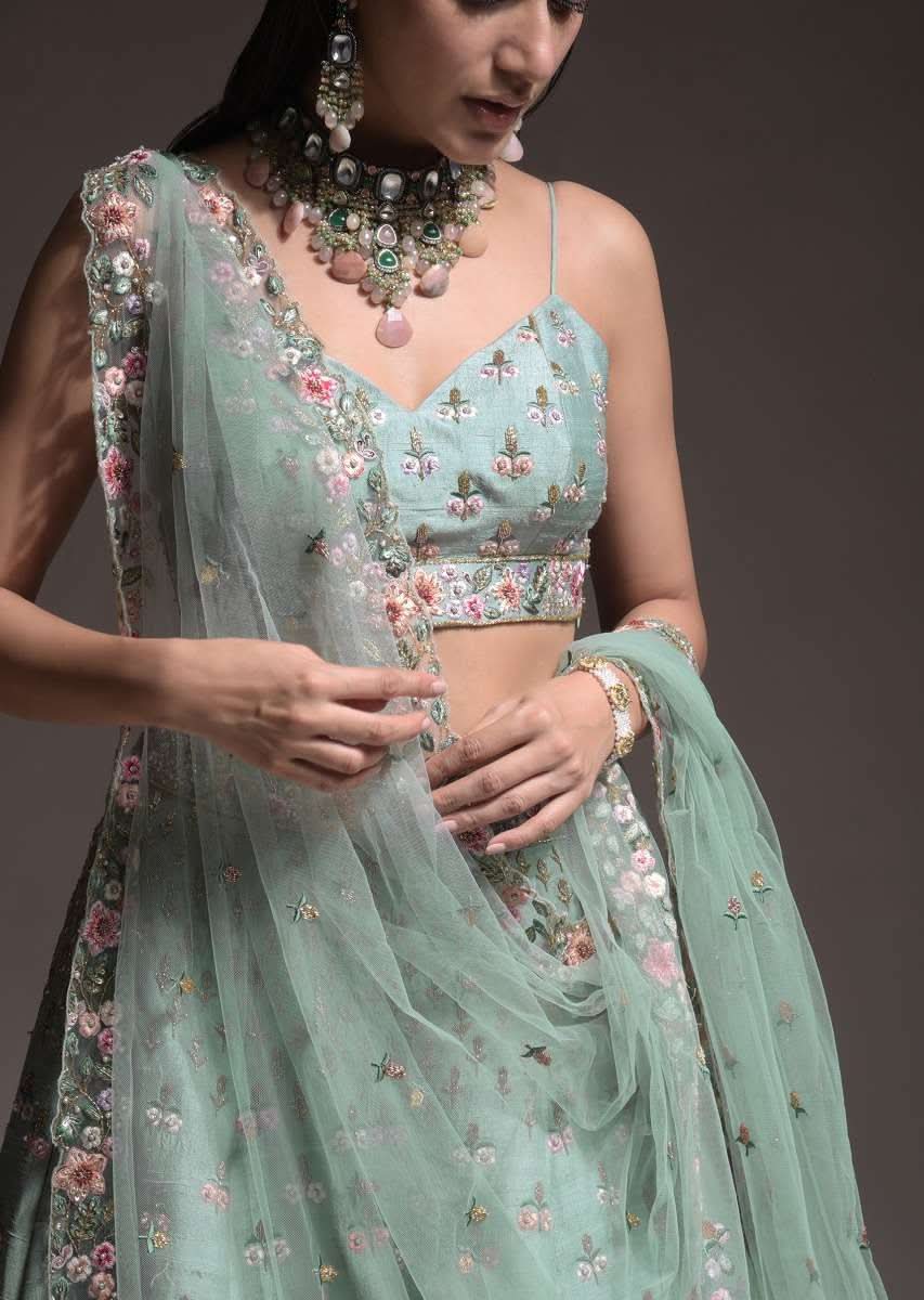 Sage Green Lehenga Choli In Raw Silk With Vibrant Resham Embroidered Cluster Of Summer Blooms And Buttis - Image 14