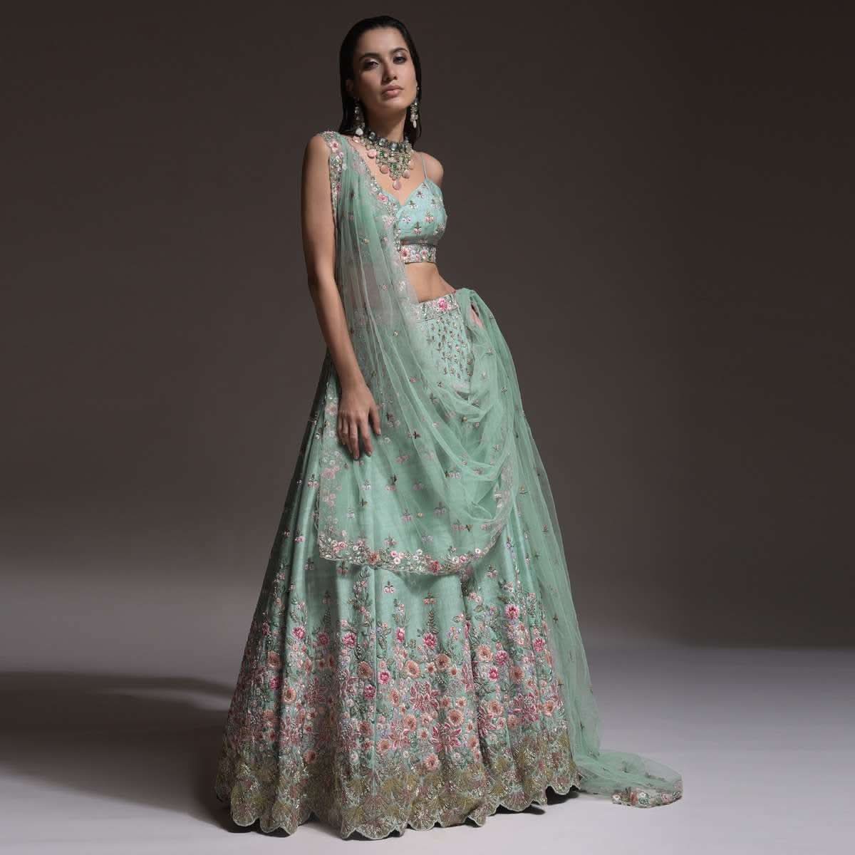 Sage Green Lehenga Choli In Raw Silk With Vibrant Resham Embroidered Cluster Of Summer Blooms And Buttis - Image 2