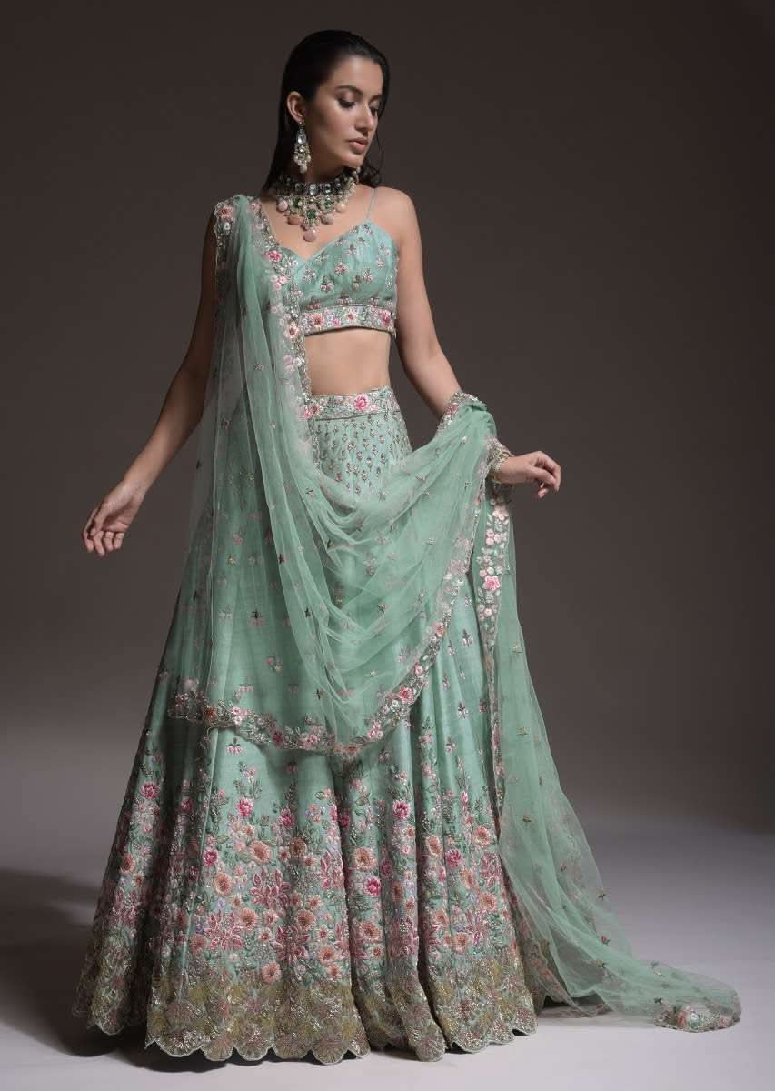 Sage Green Lehenga Choli In Raw Silk With Vibrant Resham Embroidered Cluster Of Summer Blooms And Buttis - Image 9