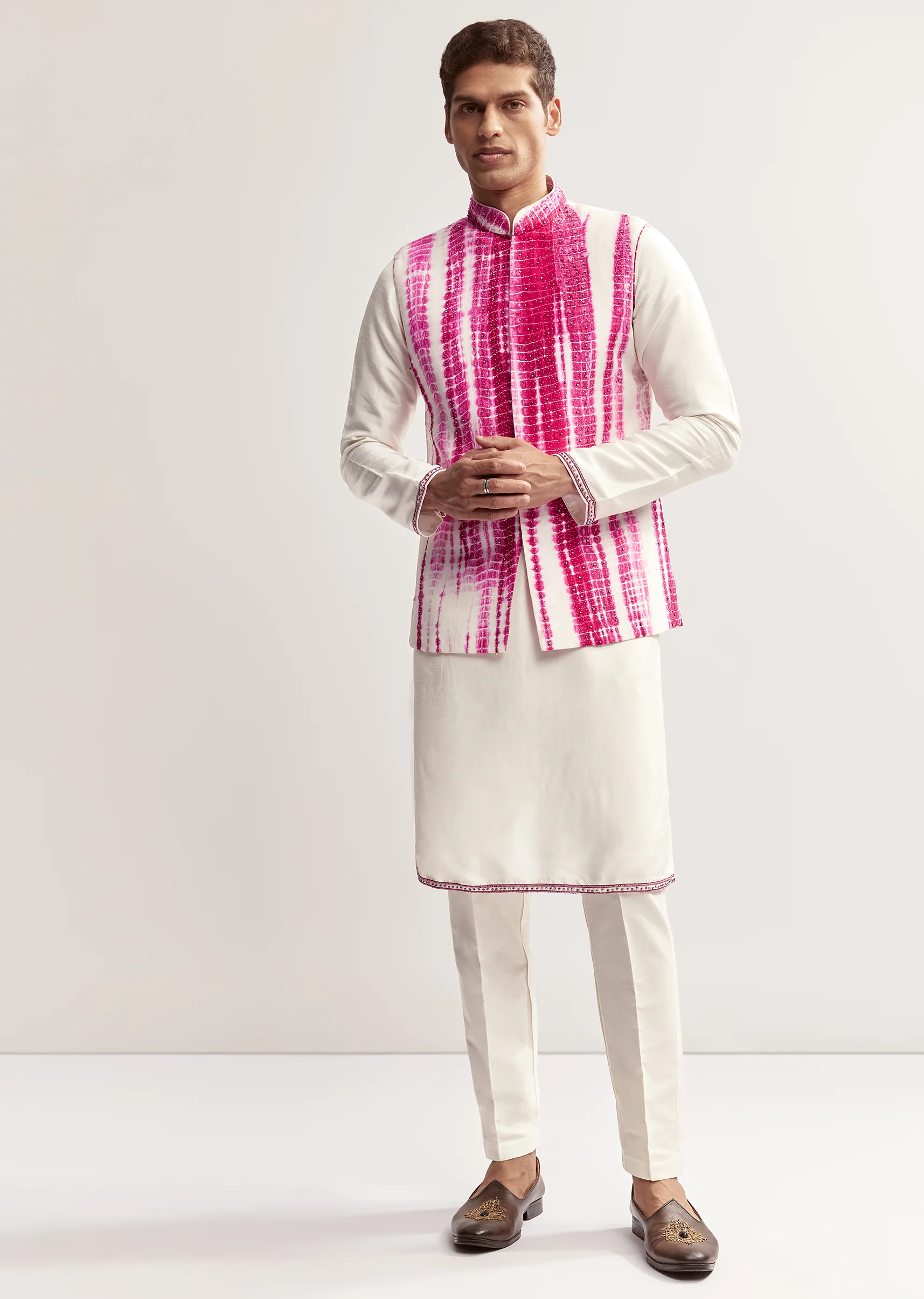 Vibrant Bandhani Festive Couple Set – Bandhani Cape Skirt Set For Her And Pink Silk Tie-Dye Kurta Jacket Set For Him - Image 8