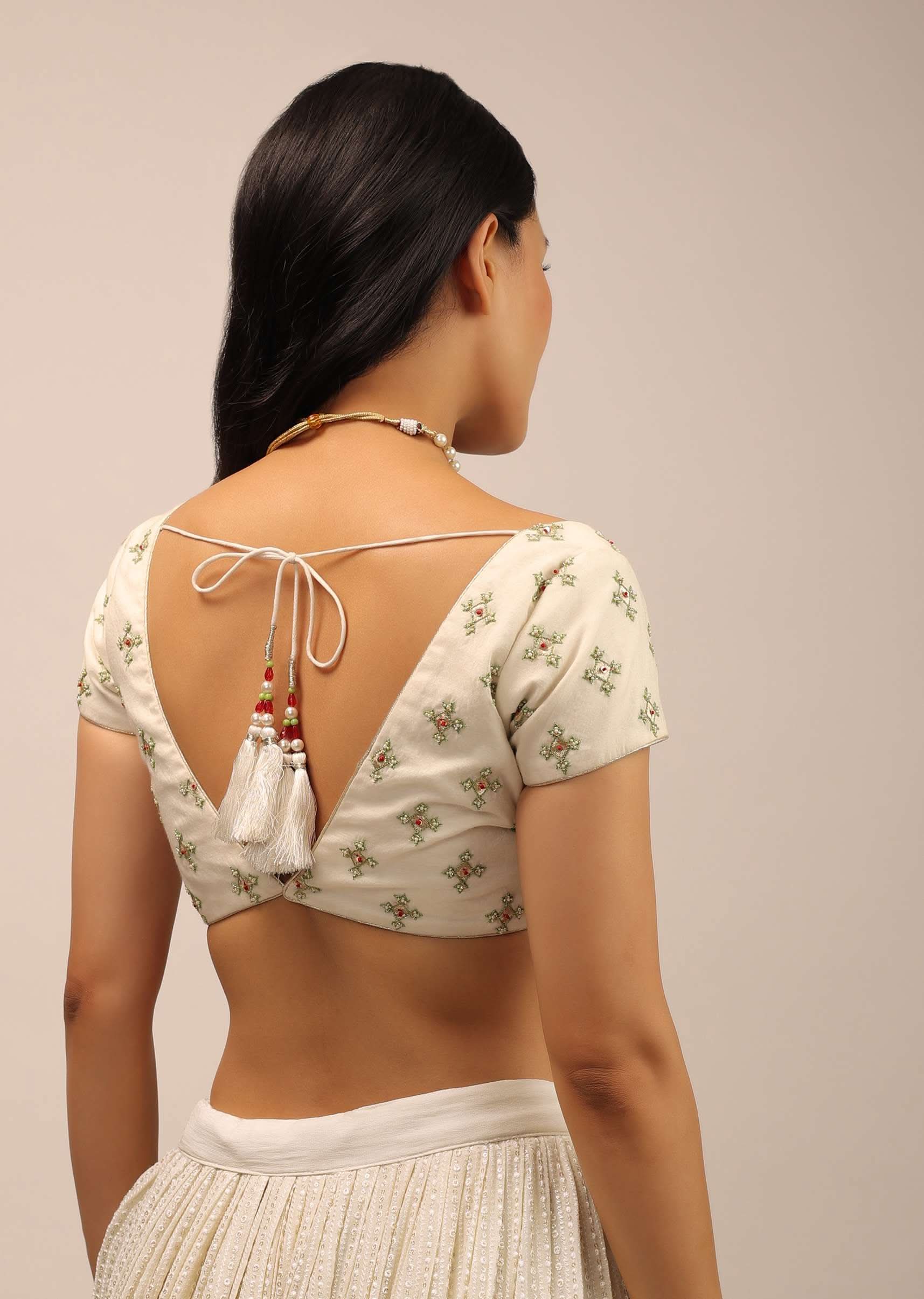 White Padded Blouse With Golden zardosi Border And Thread Work In Green - Image 2