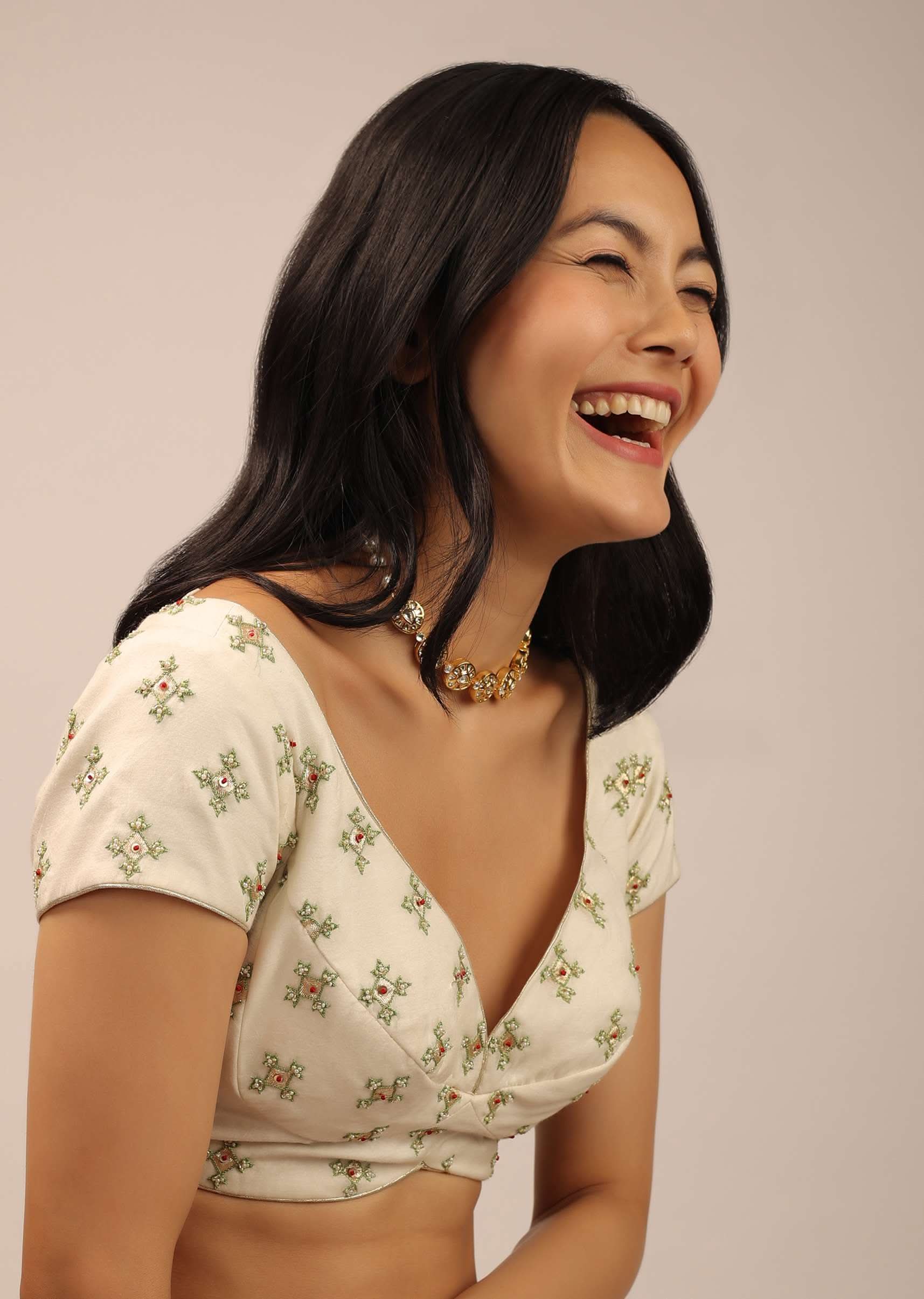 White Padded Blouse With Golden zardosi Border And Thread Work In Green - Image 3